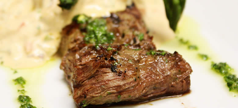 Steaks at Ola - BBQ prepared