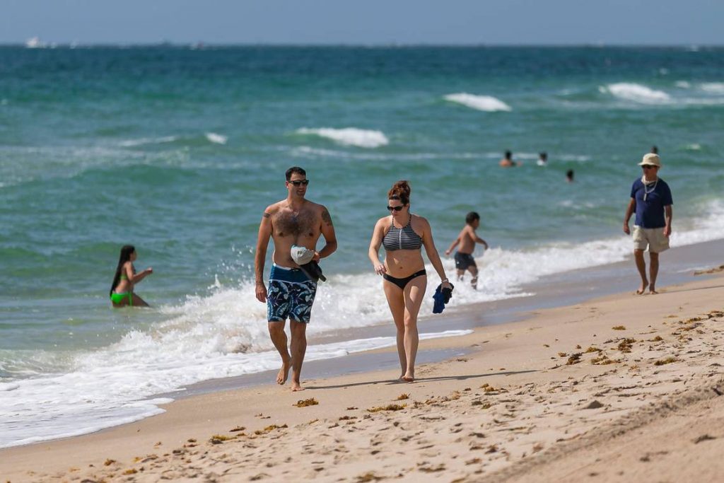 Why are Miami-Dade beaches that were to open still closed and tied to the curfew?